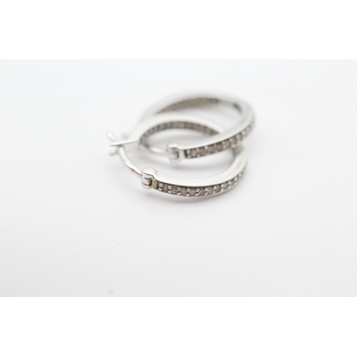 57 - 9ct white gold diamond set hoop earrings (2.6g)