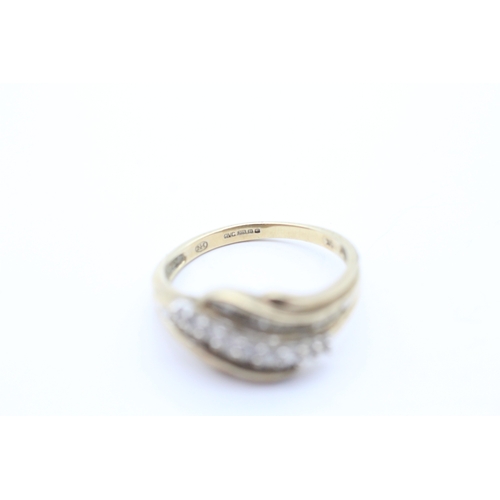 58 - 9ct gold diamond baguette cut stone set ring (3g) Size S