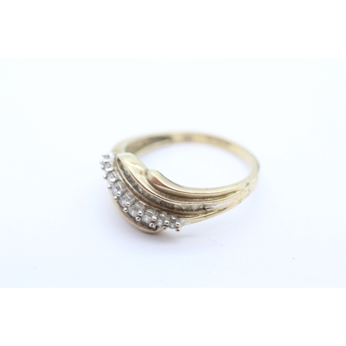 58 - 9ct gold diamond baguette cut stone set ring (3g) Size S