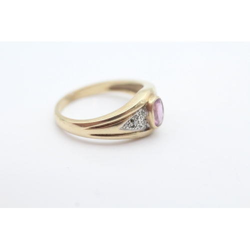 7 - 9ct gold diamond accented pink sapphire set dress ring (3.6g) Size Q