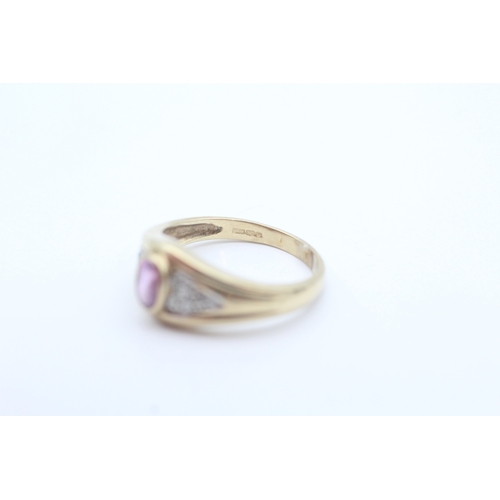 7 - 9ct gold diamond accented pink sapphire set dress ring (3.6g) Size Q