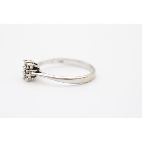 23 - 9ct white gold diamond set cluster ring (2.3g) Size R 1/2