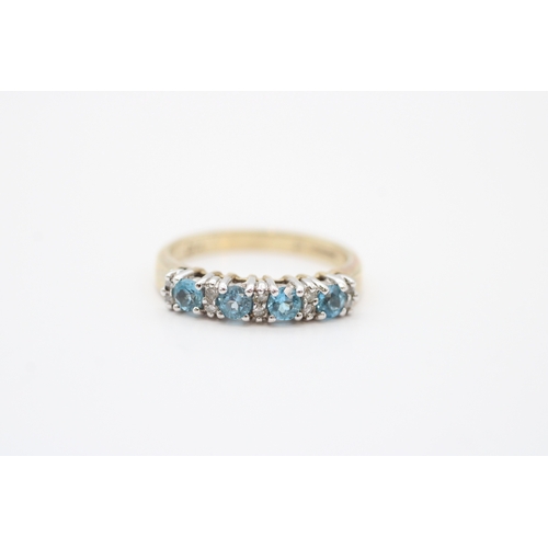 24 - 9ct gold diamond and blue topaz set eternity ring (2.8g) Size N