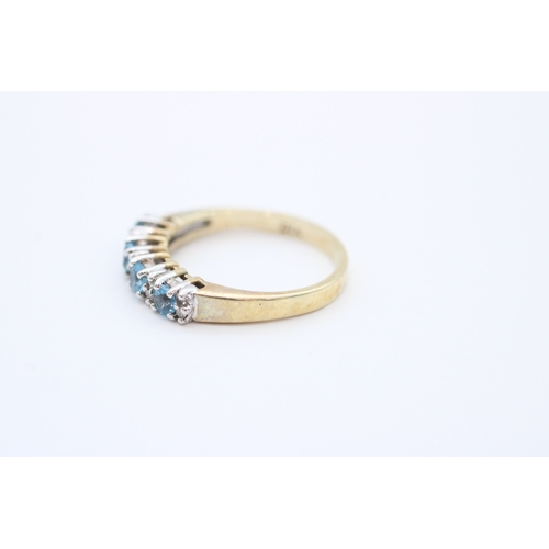24 - 9ct gold diamond and blue topaz set eternity ring (2.8g) Size N