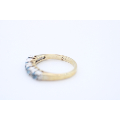 24 - 9ct gold diamond and blue topaz set eternity ring (2.8g) Size N