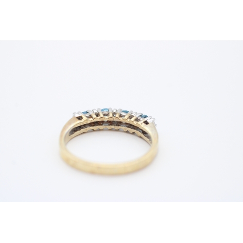 24 - 9ct gold diamond and blue topaz set eternity ring (2.8g) Size N
