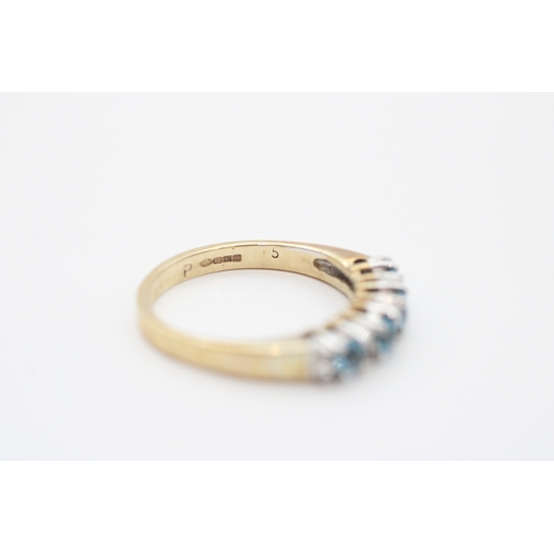 24 - 9ct gold diamond and blue topaz set eternity ring (2.8g) Size N