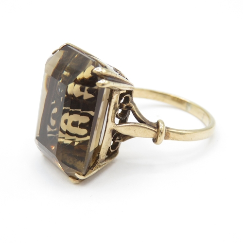 15 - 9ct gold smokey quartz cocktail ring (approx 22ct stone)