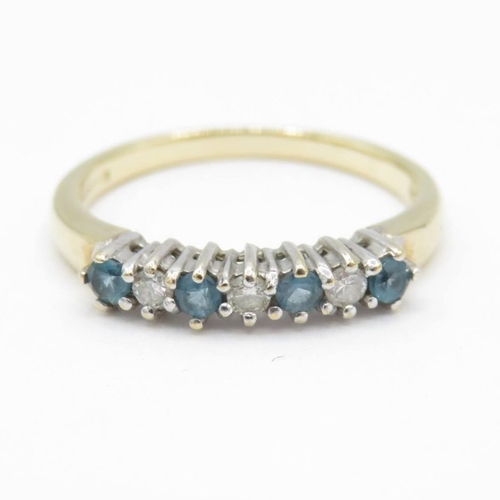 54 - 9ct gold diamond and blue topaz set eternity ring (1.8g) Size M