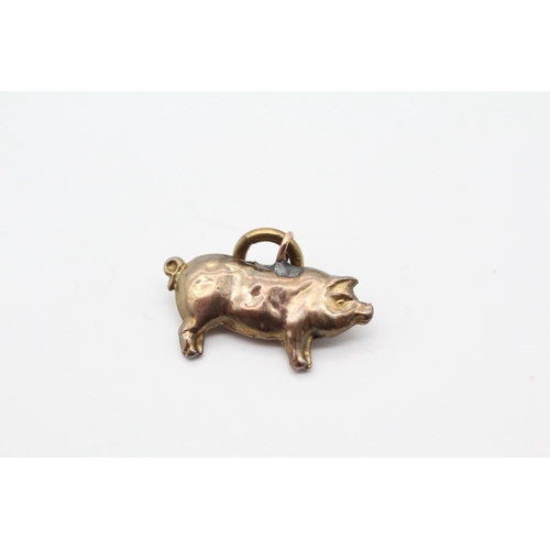 34 - 9ct gold antique pig pendant A.F - visible solder on bail (0.5g)