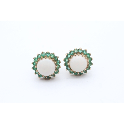 38 - 9ct gold emerald and opal halo stud earrings (2.3g)