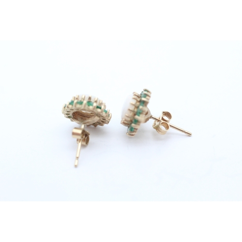 38 - 9ct gold emerald and opal halo stud earrings (2.3g)