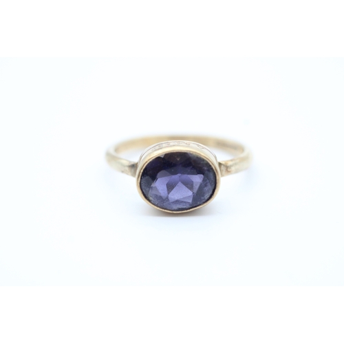 40 - 9ct gold iolite set 