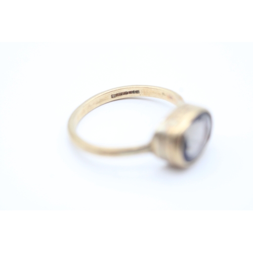 40 - 9ct gold iolite set 