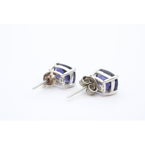 50 - 9ct white gold chequer cut iolite set stud earrings (1.9g)