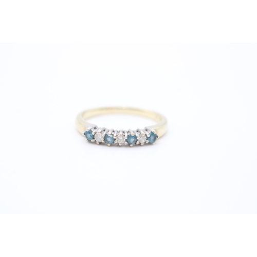 54 - 9ct gold diamond and blue topaz set eternity ring (1.8g) Size M