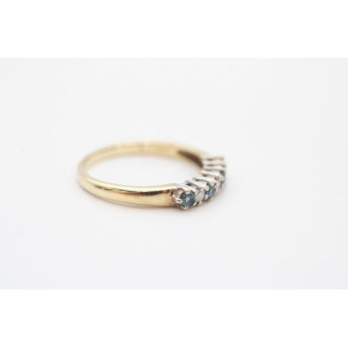 54 - 9ct gold diamond and blue topaz set eternity ring (1.8g) Size M
