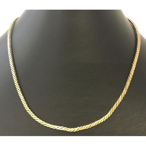 26 - A 9ct gold serpentine style chain necklace. Tests as 9ct gold. Total weight approx. 12.7g.