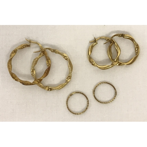 59 - 3 pairs of 9ct gold hoop earrings in varying sizes. 2 pairs of twisted style hoops together with a s... 