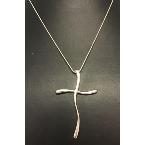 1013 - A large modern design cross pendant on a 16