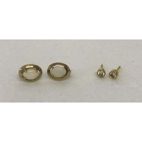 1038 - 2 pairs of 9ct gold stud style earrings. A pair of oval cut opal stones in oval gold mounts. Togethe... 