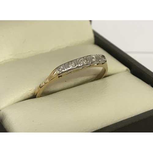 1039 - A vintage 18ct gold and diamond eternity style ring. Set with 5 graduating size diamonds. Size O½. T... 