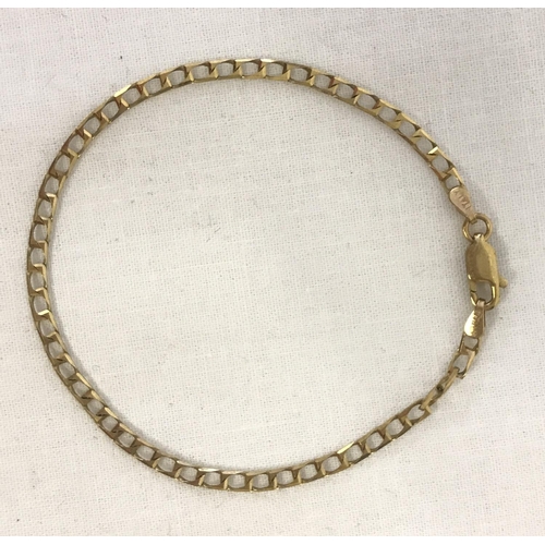 1057 - A 9ct gold fine curb chain bracelet with lobster claps. Approx. 7 inches long.  Total weight approx.... 