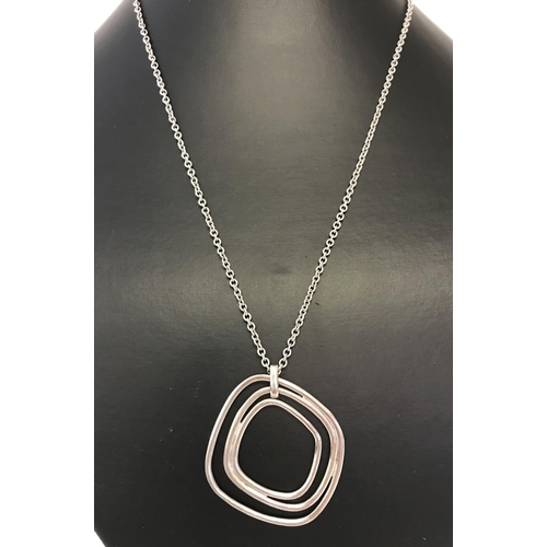 1148 - A modern design silver pendant on a 18 inch belcher chain by Jasper Conran. 925 mark to pendant, cla... 