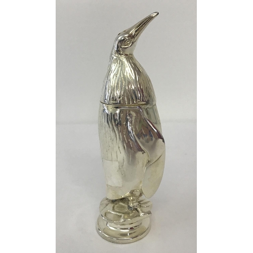 1185 - A heavy silver plated novelty penguin shaped sugar sifter.  Approx. 18.5cm tall.