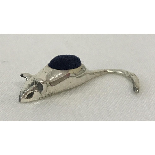 1188 - A miniature sterling silver pin cushion in the shape of a mouse with blue velvet cushion.  Approx. 3... 