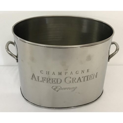 1203 - An oval shaped 2 handled Alfred Gratien champagne cooler with engraved detail to front.  Approx. 18.... 