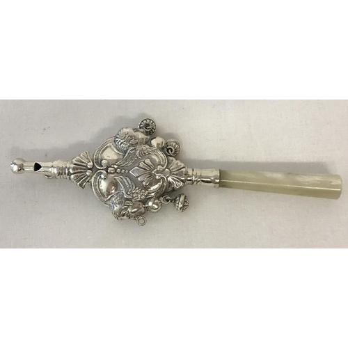 1212 - A 925 silver babies rattle with whistle head and mother of pearl handle. Decorative body with angel ... 