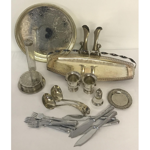 1218 - A quantity of assorted silver plated items to include tray, coasters, serving spoons & fish cutlery.