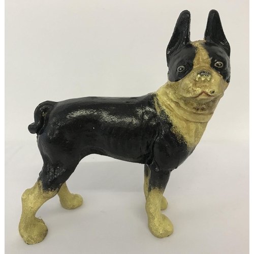 1228 - A cast iron figurine of a French Bulldog, in black and cream.  Approx. 21cm x 18cm.