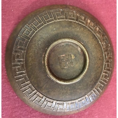 1317 - A small bronze Chinese dish with dragon and phoenix detail to inner bowl. Signed to underside. Appro... 