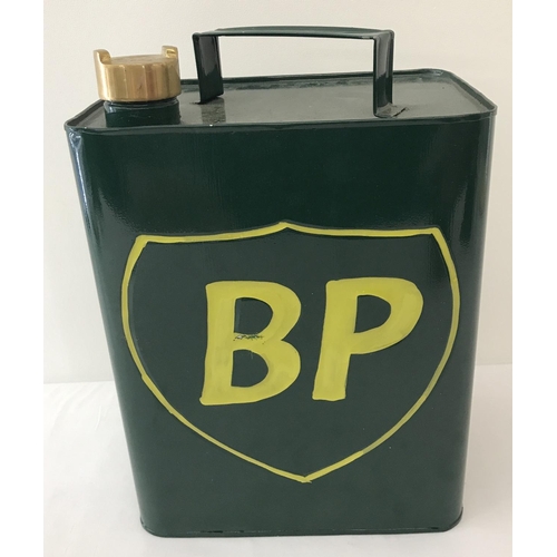 1358 - A painted green 2 gallon BP petrol can with brass screw lid.