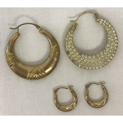 1007 - 2 pairs of hoops style earrings. A larger pair set with clear stones to one side. Together with a sm... 