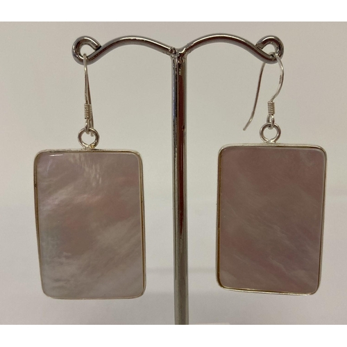 1031 - A pair of rectangular shaped silver mounted mother of pearl drop earrings. Marked 925 to reverse. Ap... 