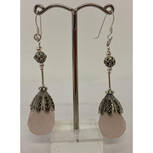 1034 - A pair of silver and rose quartz drop earrings set with marcasite's.  Approx. 6cm long.