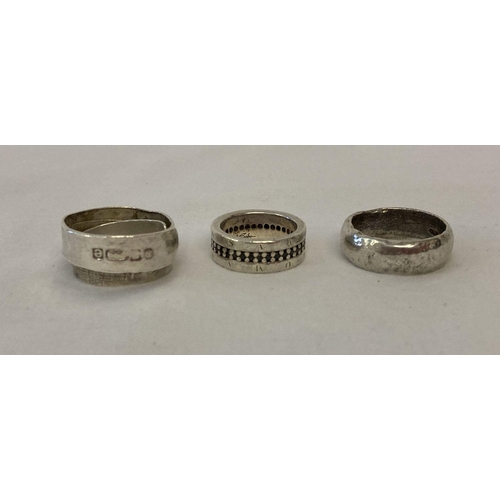 1091 - 3 silver band rings to include designs by Paul Magen and Thomas Sabo. A hammered design by Paul Mage... 