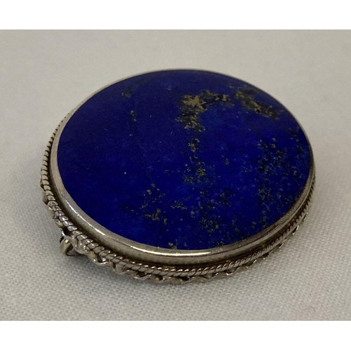 1108 - A vintage silver and lapis lazuli brooch. Fine bead and rope design to outside edge of mount. Back o... 