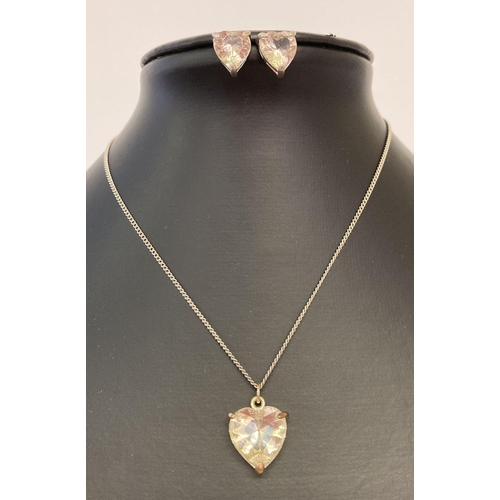 1116 - A matching heart shaped pendant and earrings set, with pale yellow coloured stones. Pendant on a 925... 