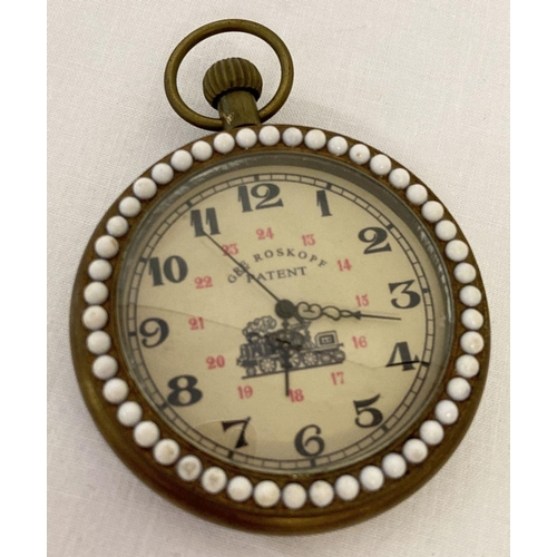 1117 - A brass cased pocket watch with beaded detail to surround front and back.  Watch face approx. 4.5cm ... 