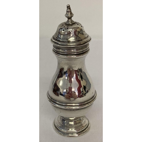 1155 - A vintage silver pepperette with turned finial design and engraved detail to lid. Fully hallmarked L... 