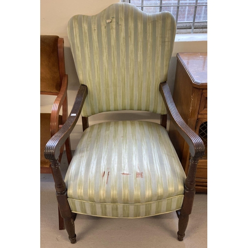 1615 - A Victorian dark wood framed armchair with channelled detail to frame and green coloured upholstery.