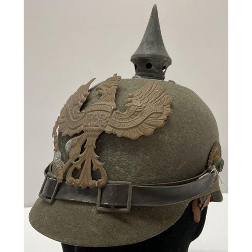 122 - A WWI style Imperial German ersatz felt pickelhaube helmet.