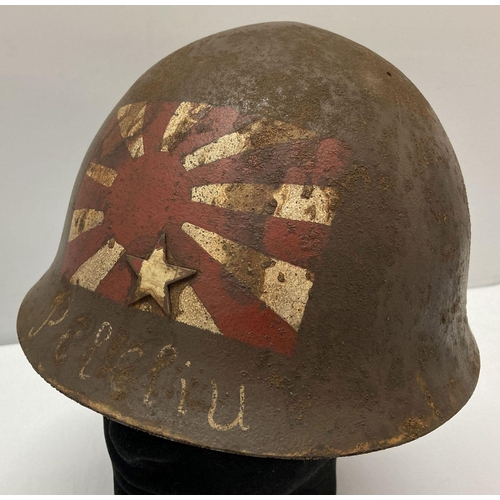 124 - A WWII style veteran souvenir Japanese helmet from 