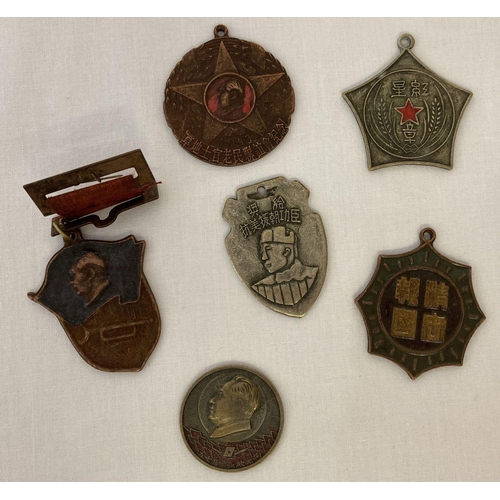 375 - A collection of 6 Chinese medals and badges.