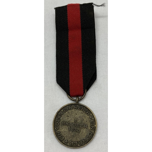 376 - A WWII style German Sudetenland medal on ribbon.