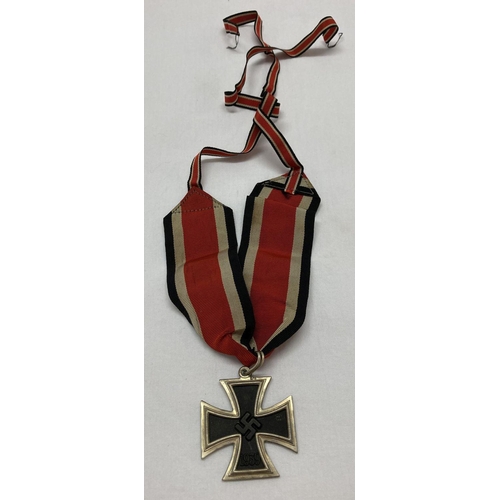 382 - A WWII style tailor's copy Knight's Cross medal with ribbons.